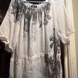 Light and see threw white short sleeved shirt